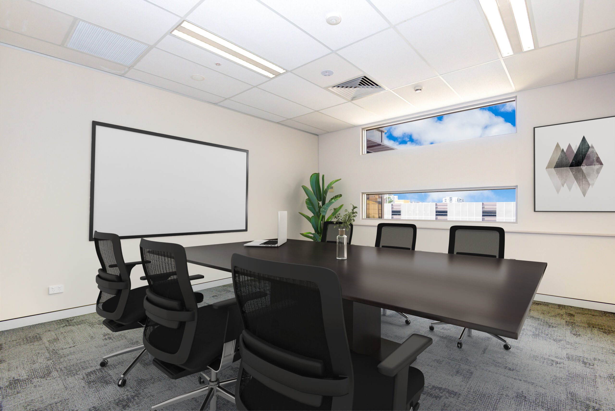 Conference room with a large screen, table and chairs