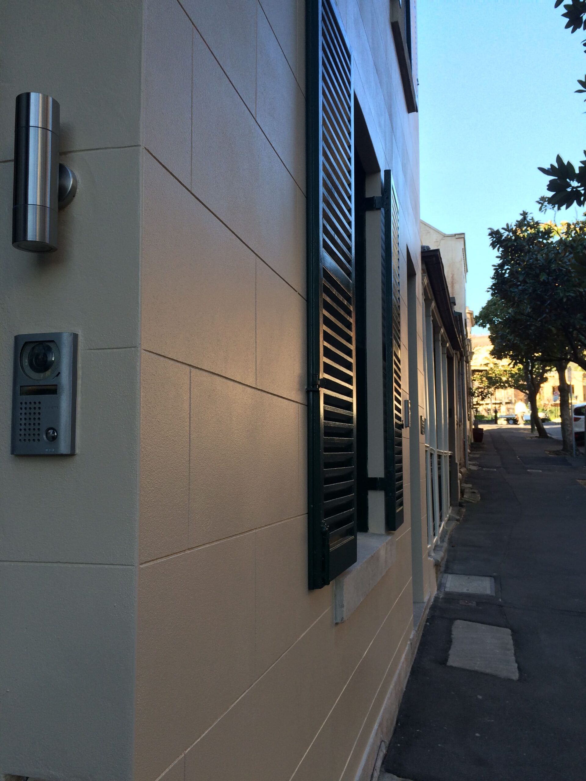 A remedial building with windows shutters
